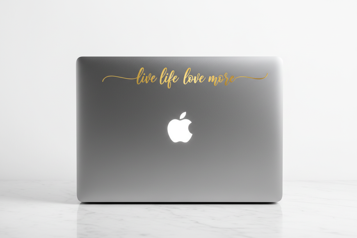 Laptop with gold decal positioned away from logo